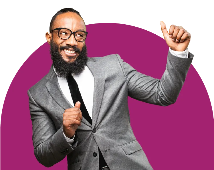 A small green plant with two leaves grows out of a glass jar filled with assorted coins. The background is blurred with soft, natural light, focusing attention on the plant and the jar.